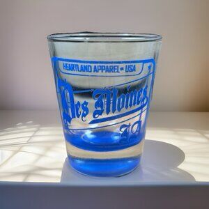 Souvenir shot glass Des Moines, Iowa Vintage Apparel USA Clear & Blue 2.5” Tall